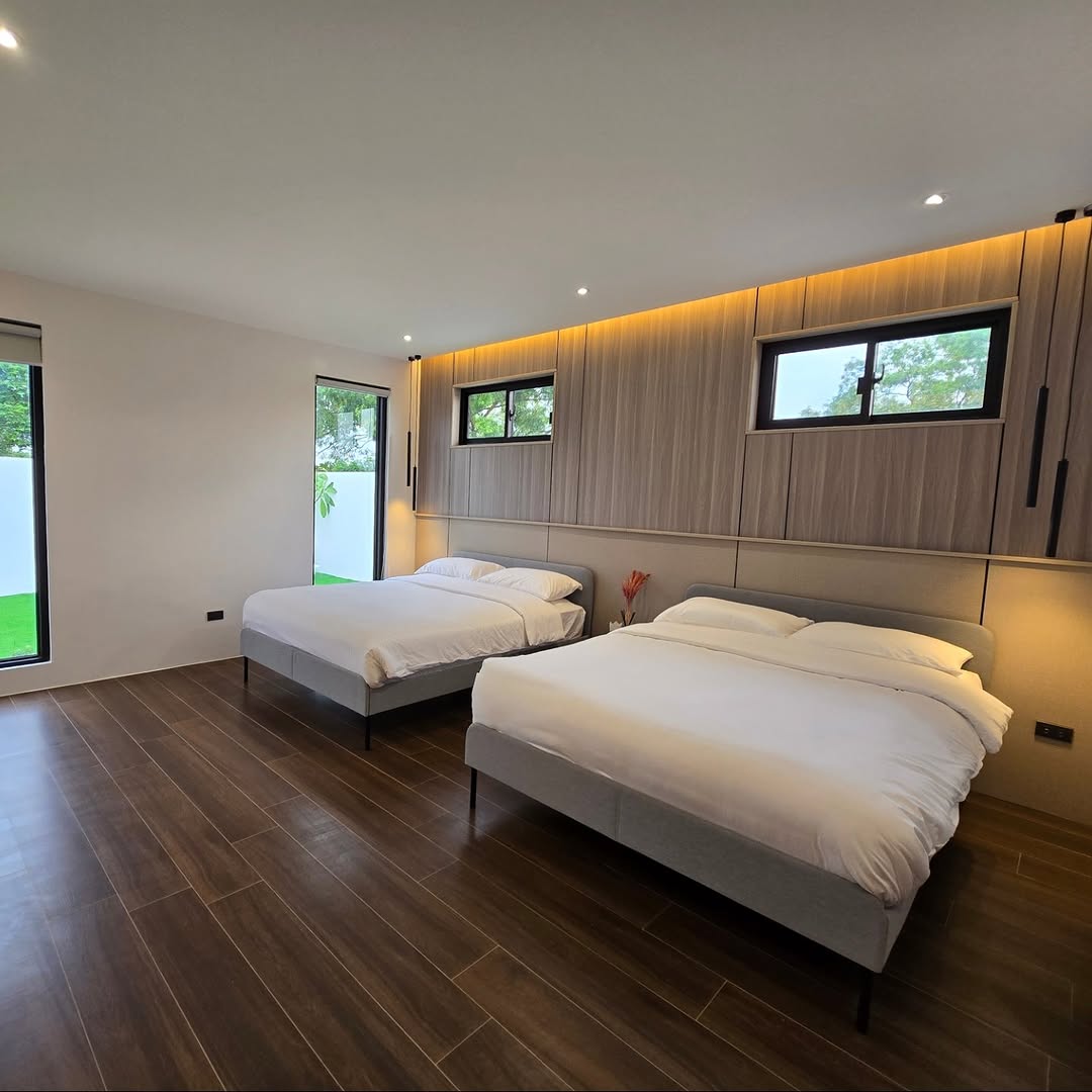 Bedroom 1 with queen bed and cool interiors